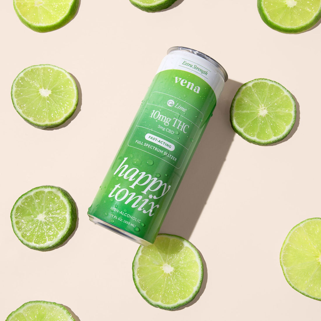 Green Vena lime sparkling seltzer can labeled 10mg THC and 5mg CBD, surrounded by lime slices
