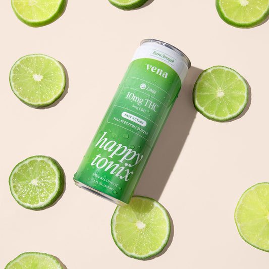 Green Vena lime sparkling seltzer can labeled 10mg THC and 5mg CBD, surrounded by lime slices
