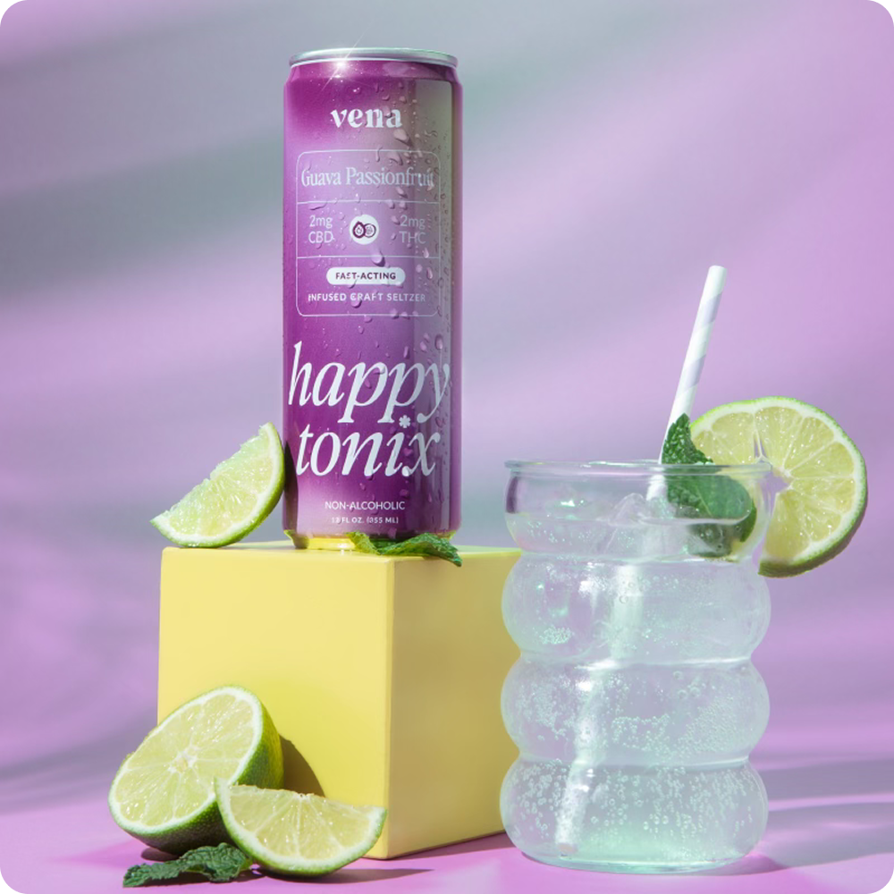Purple can reading 'vena', 'Guava Passionfruit', 'happy tonix', 'non-alcoholic' beside a bubbly glass and lime wedges.