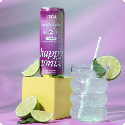 Purple can reading 'vena', 'Guava Passionfruit', 'happy tonix', 'non-alcoholic' beside a bubbly glass and lime wedges.