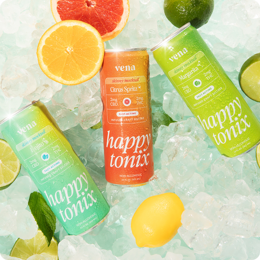 Front view of three Vena Happy Tonix skinny mocktail cans showcasing the “happy tonix” label and flavor colors on crushed ice with citrus slices