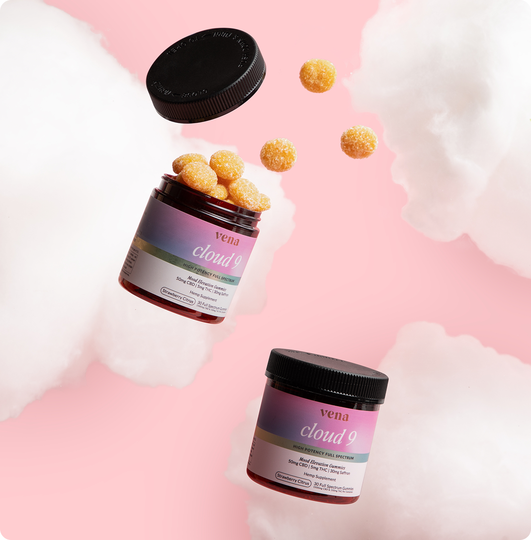 Two vena cloud 9 gummy jars and sugar-coated gummies floating among cotton-like clouds on pink background.