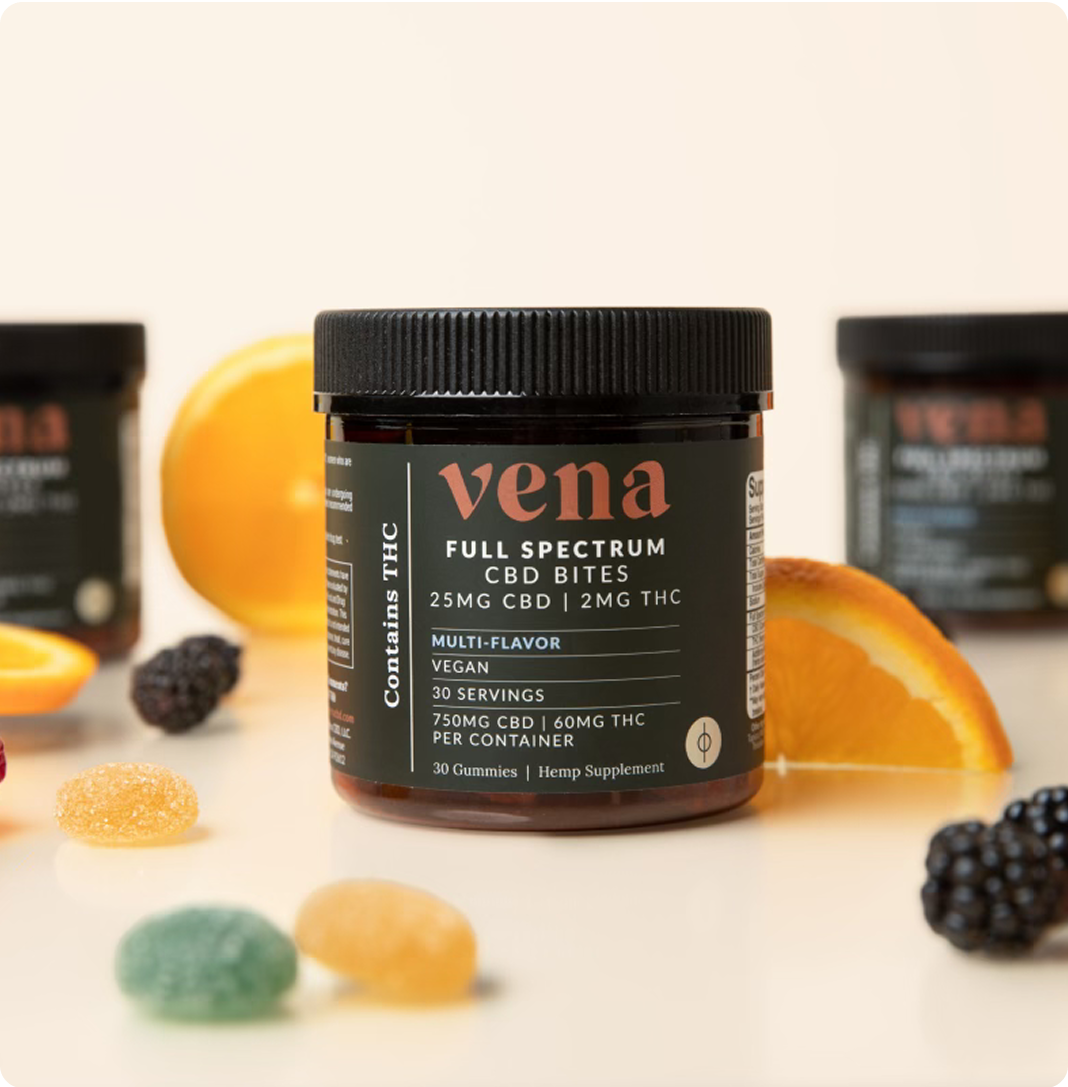 Front view of Vena Full Spectrum CBD Bites jar showing label 25 mg CBD and 2 mg THC with gummies and orange on pale backdrop
