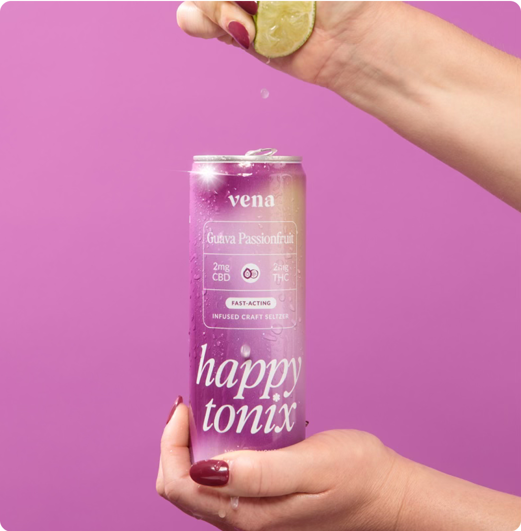 Hand holding purple can labeled vena, Guava Passionfruit, 2mg CBD, 2mg THC, FAST-ACTING, INFUSED CRAFT SELTZER, happy tonix