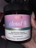 Front view of Cloud 9 gummy jar showcasing pastel gradient label reading it’s a cloud 9 and a black screw-top lid against a dark background